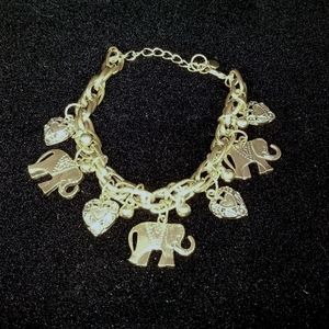 NWT Gold Charmed Elephant Bracelet.